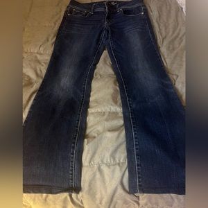 American Eagle woman’s low rise boot cut jeans.